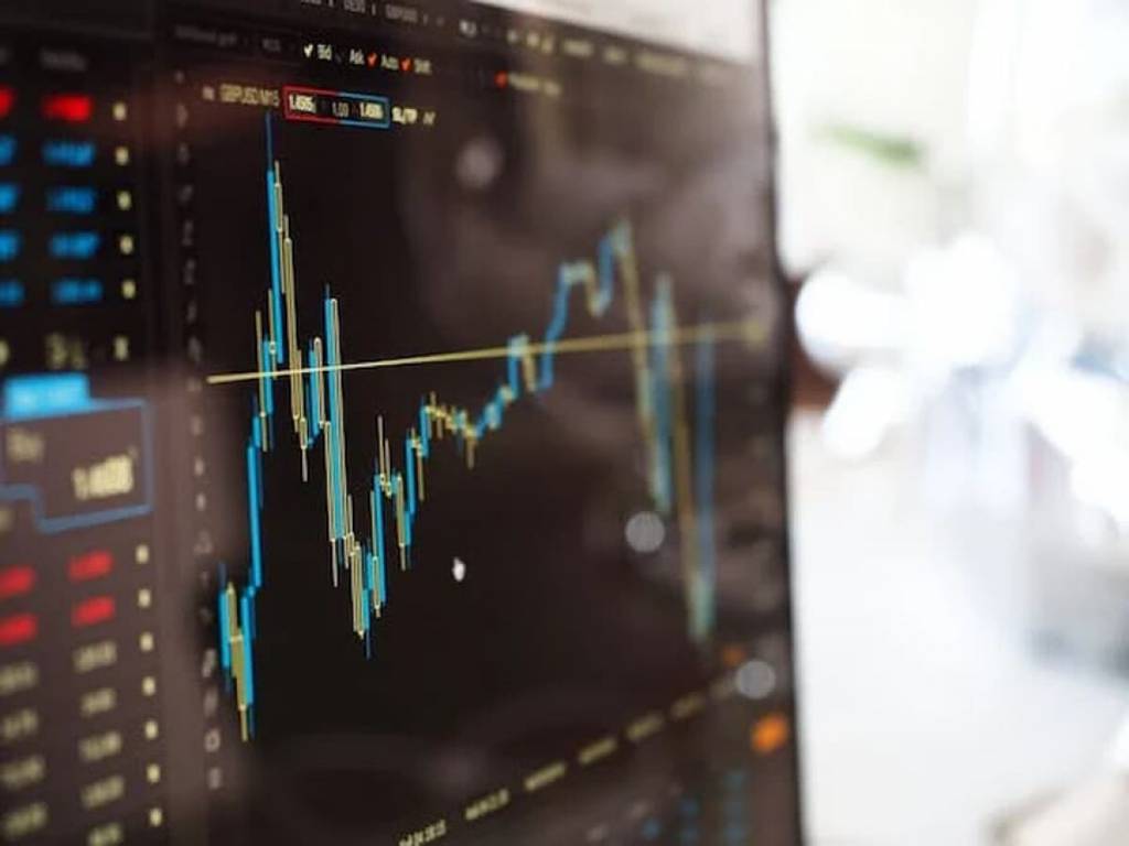Bolsas de Nova York fecham sem direção única à espera de resultados corporativos